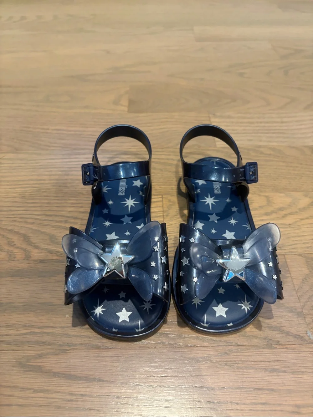 Mini Melissa Navy Star Jelly Sandals with Bow and Silver Star Accent. Never worn